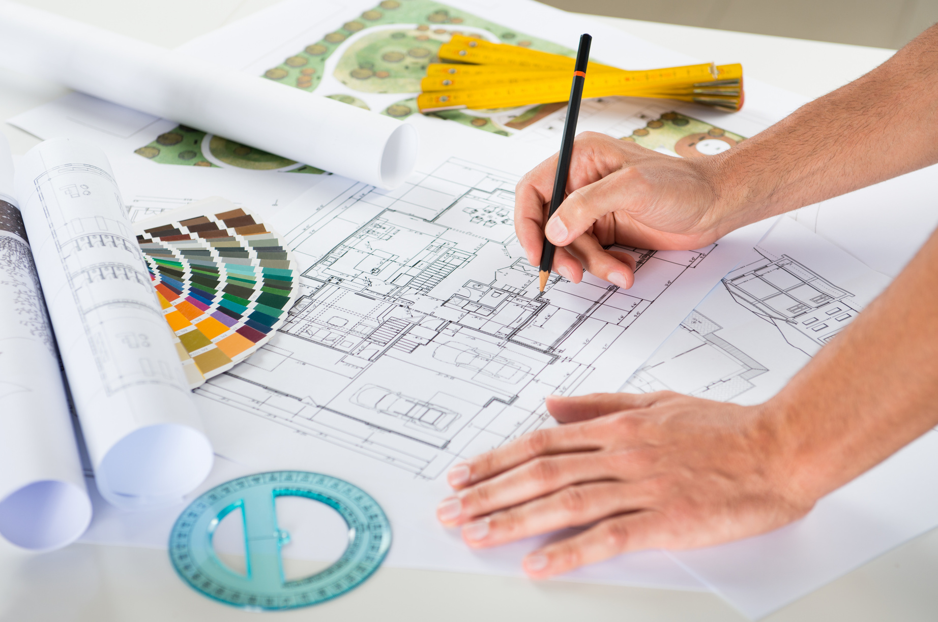 Draftsman Drawing Plan on Blueprint